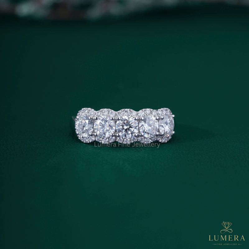 Round diamond wedding band with five stone wedding band.