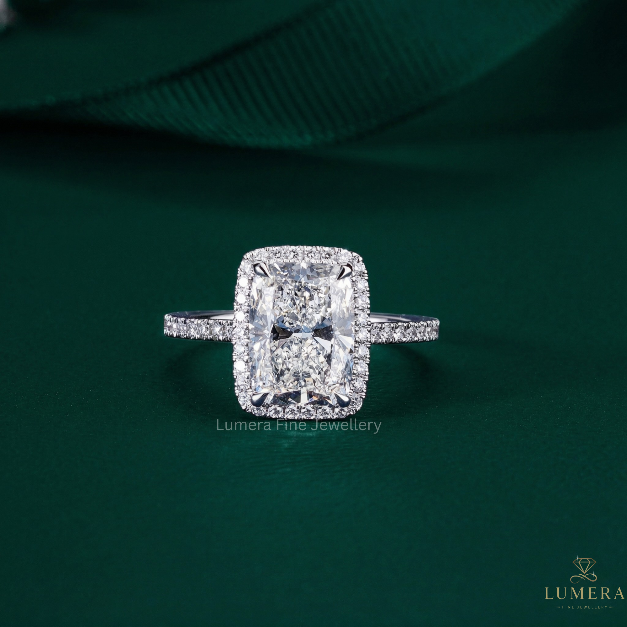 Cushion cut engagement ring with cathedral style engagement ring.