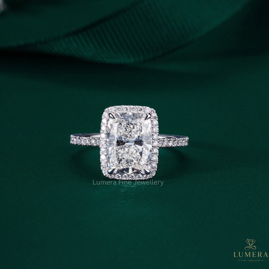 Cushion cut engagement ring with cathedral style engagement ring.