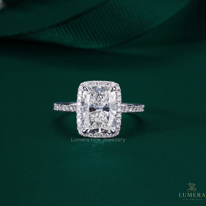 Cushion cut engagement ring with cathedral style engagement ring.
