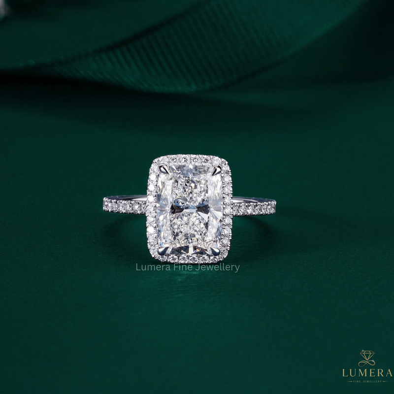 Cushion cut engagement ring with cathedral style engagement ring.