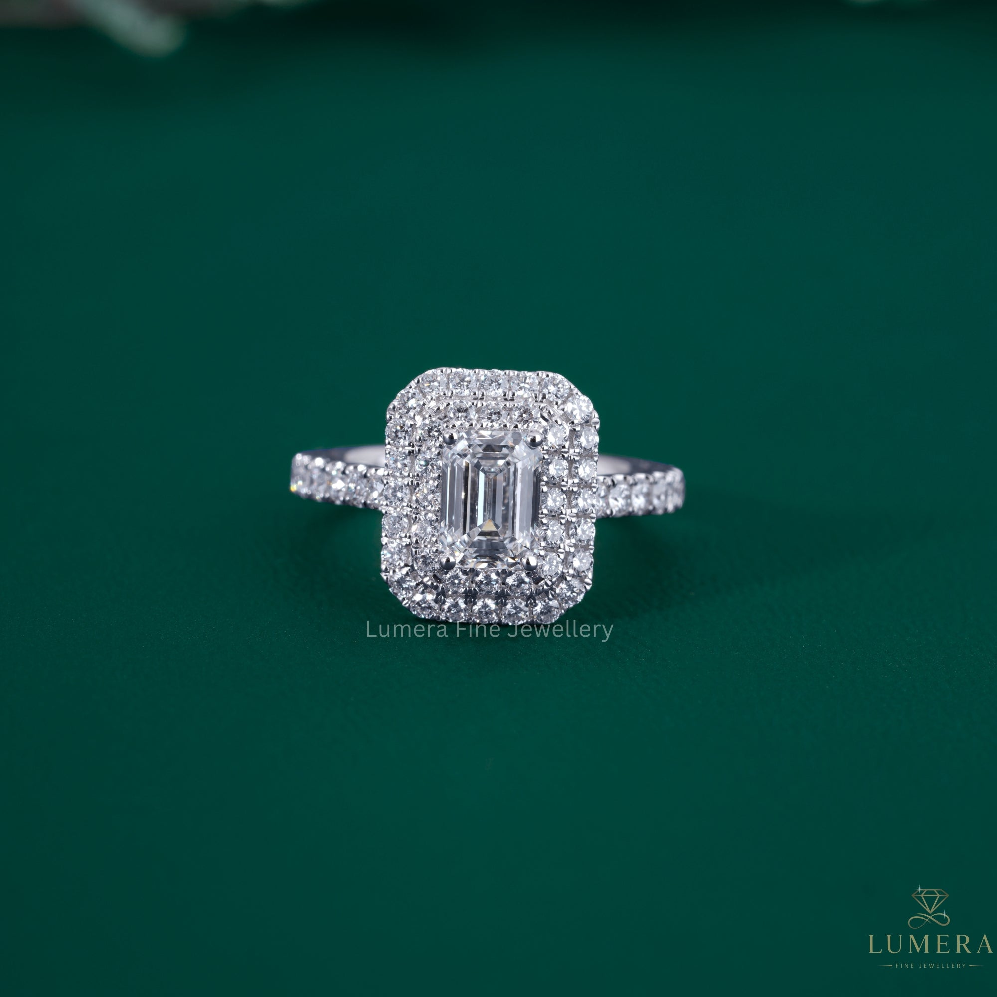 Emerald cut diamond engagement ring with double halo engagement ring.