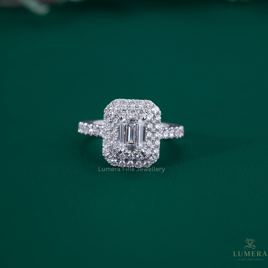Emerald cut diamond engagement ring with double halo engagement ring.
