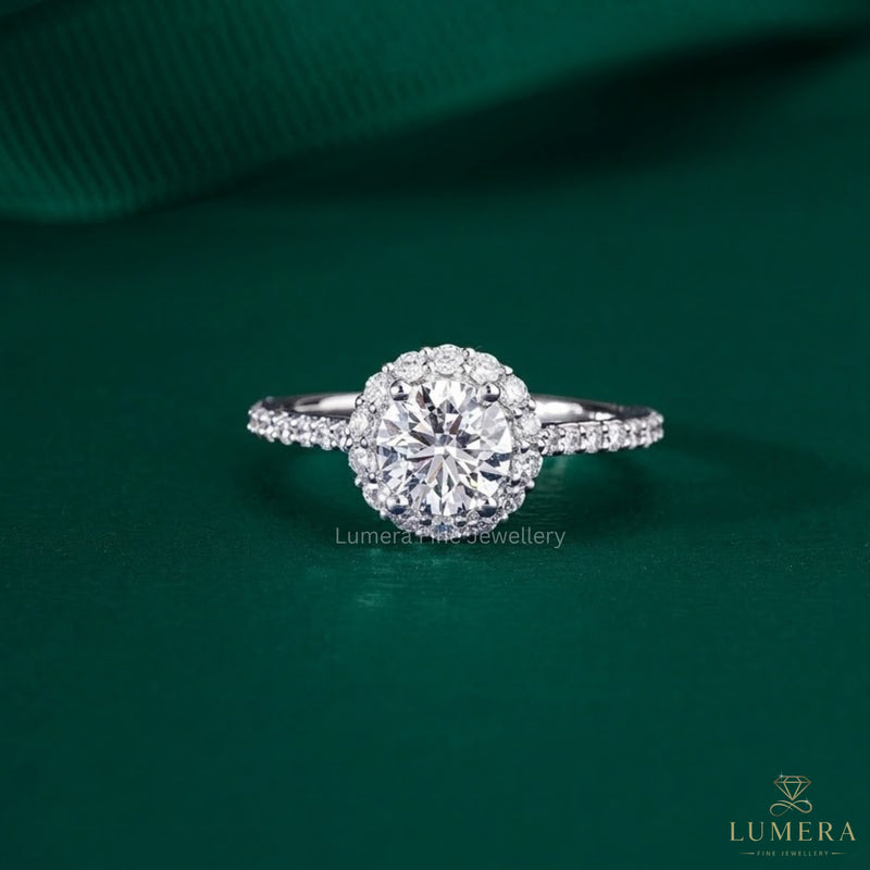 round cut diamond ring with cathedral setting ring.
