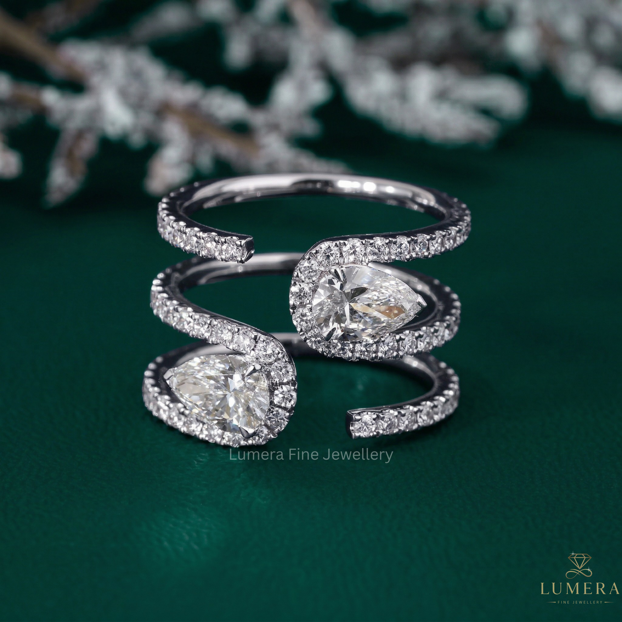 pear shaped wedding band with Two Stone Spiral Diamond Ring.
