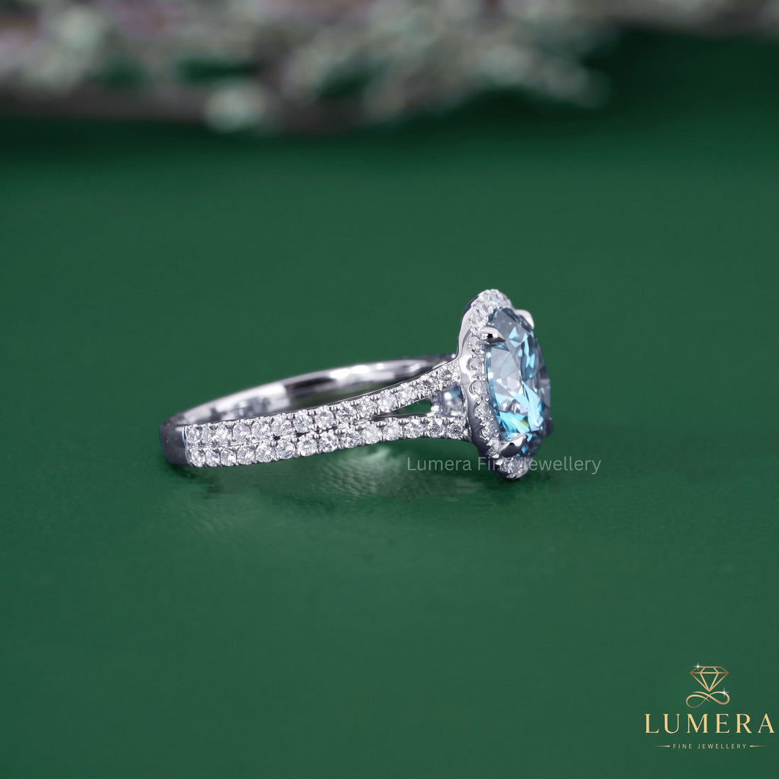Halo diamond ring with two row pave band.