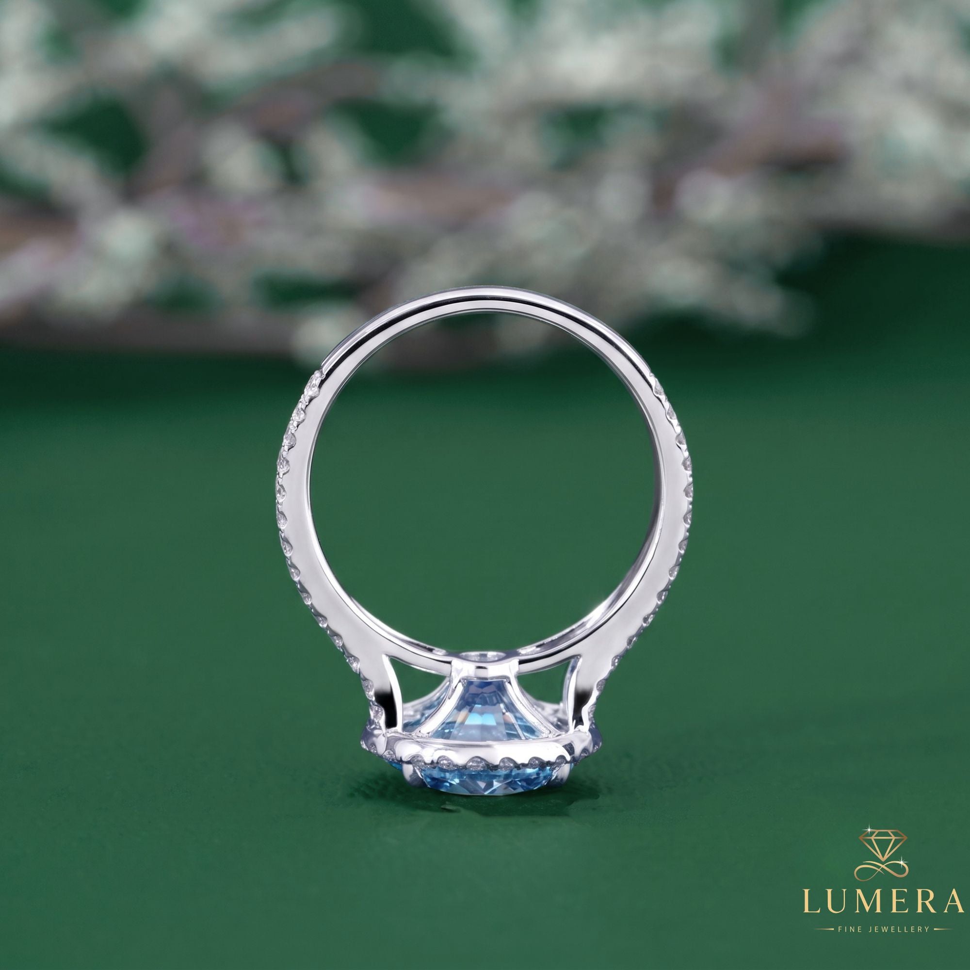 Round cut ring with pave ring.