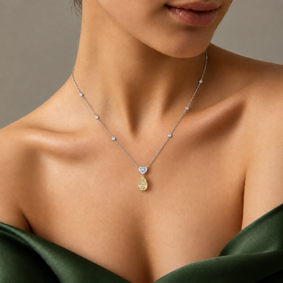 pear heart pendant with teardrop dangle pendant.
