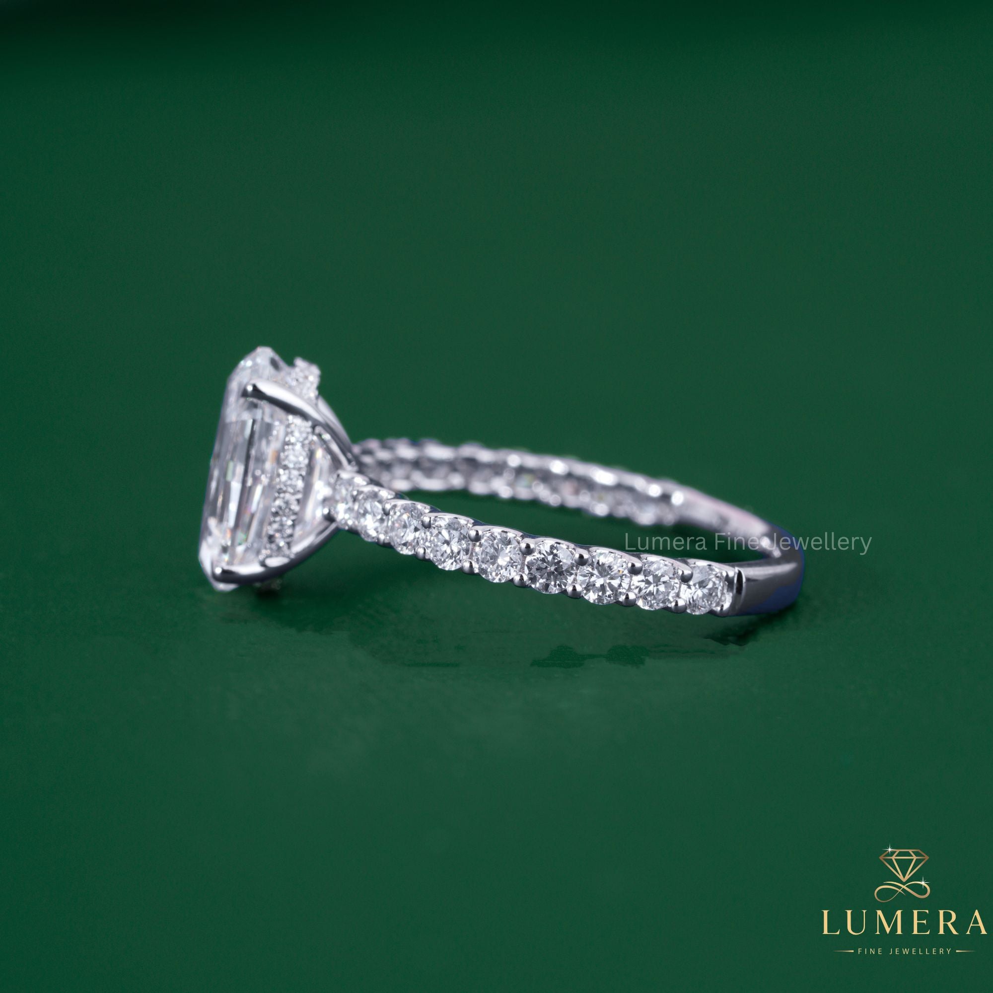 Step cut diamond ring with pave diamond ring.