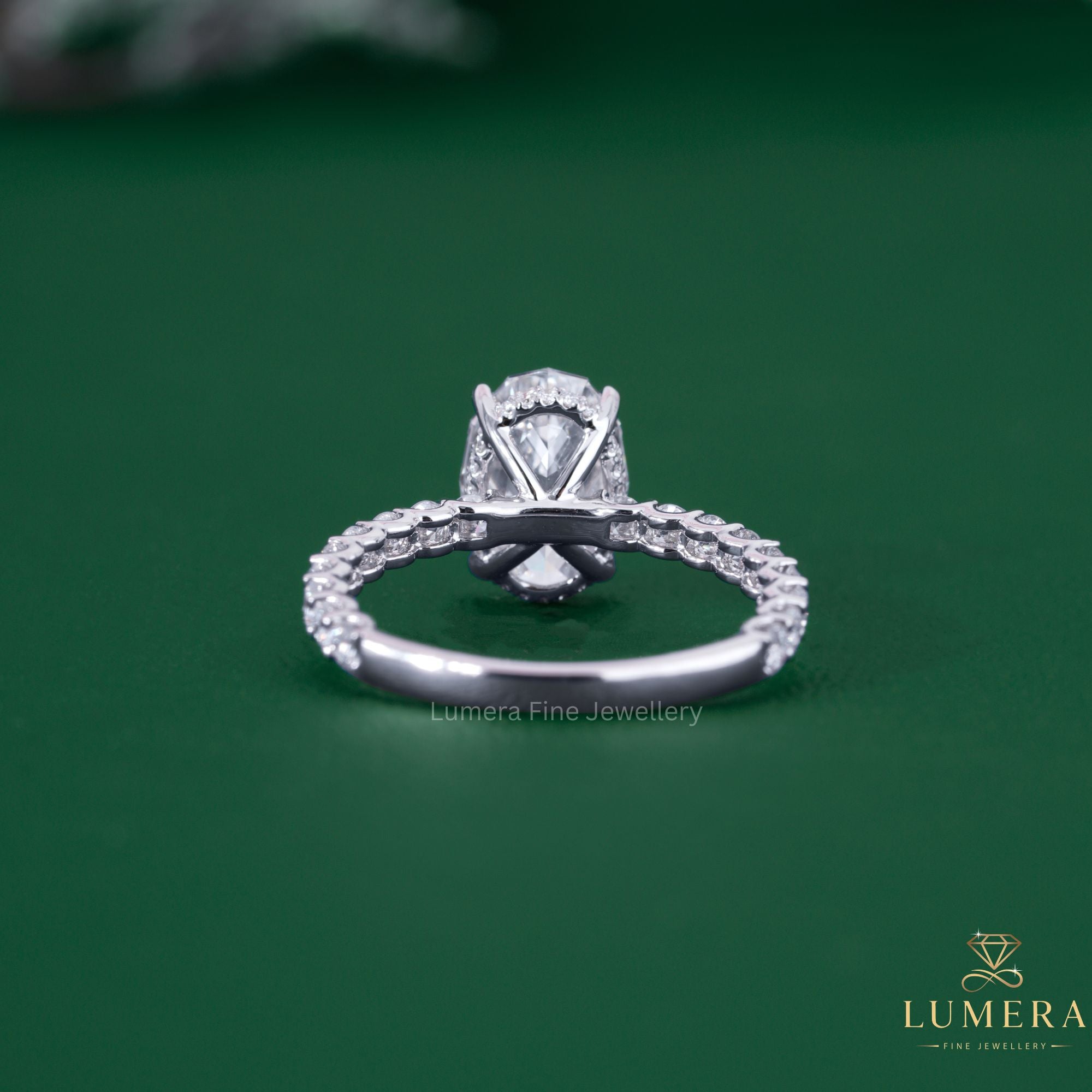 Oval diamond ring with hidden halo engagement ring.