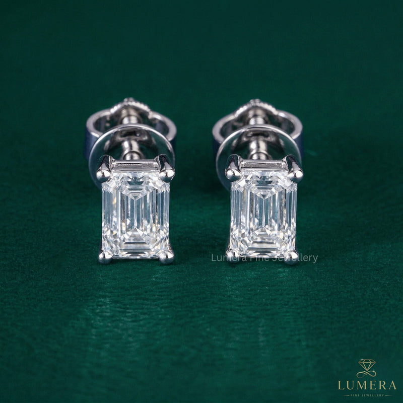 emerald cut solitaire earrings with emerald cut earrings.
