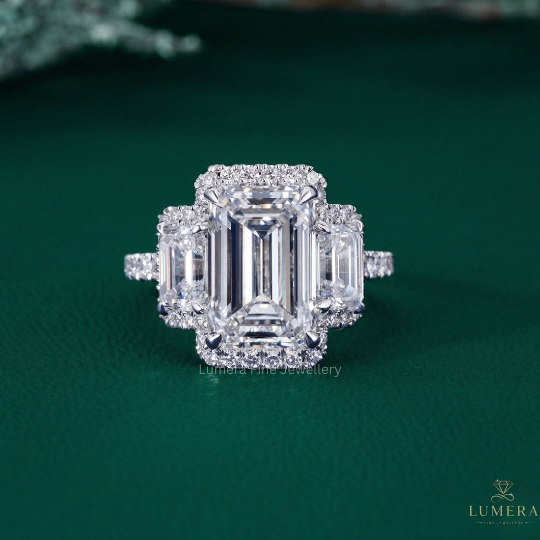 Three stone Engagement Ring with Emerald three stone ring.