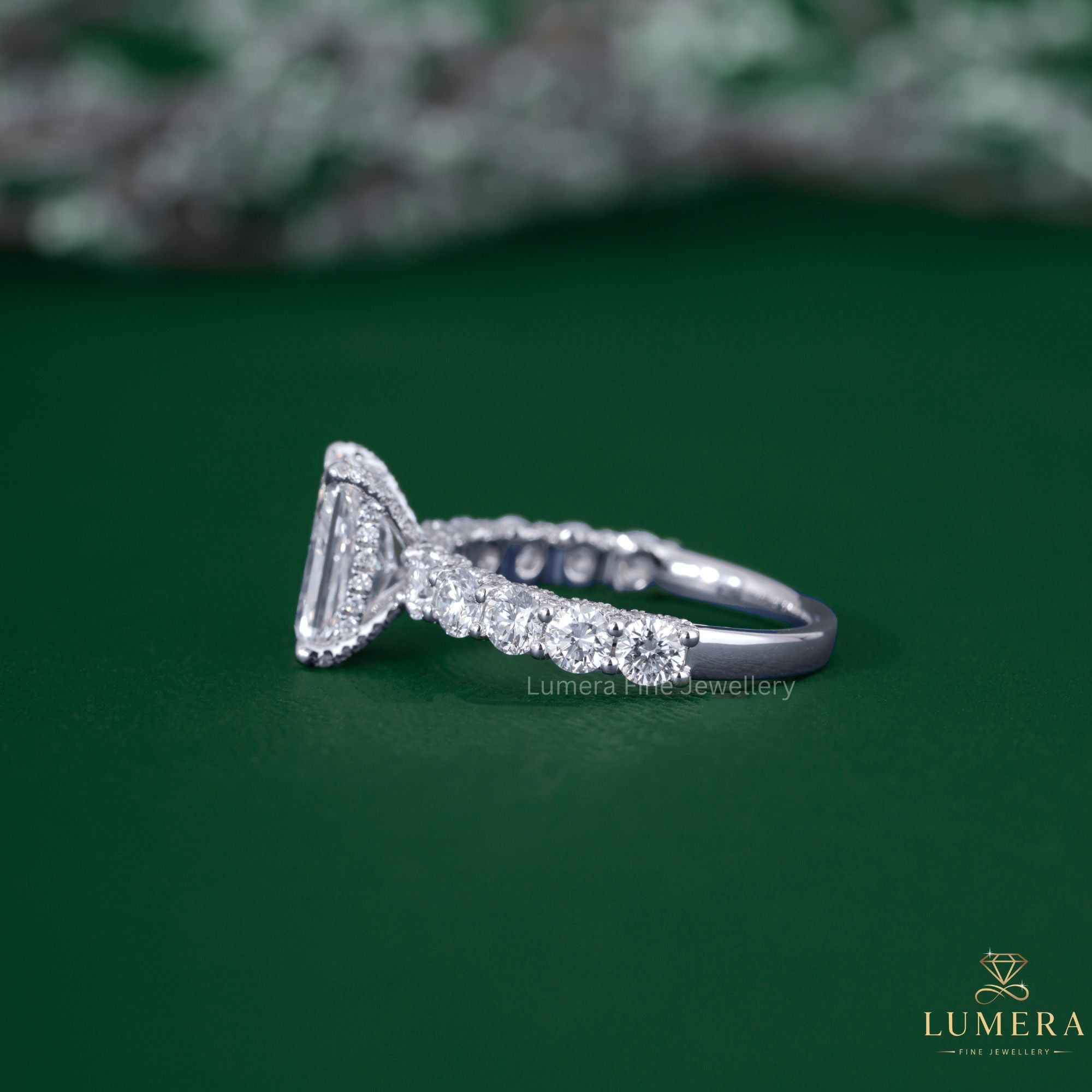 U prong setting with hidden halo engagement ring.