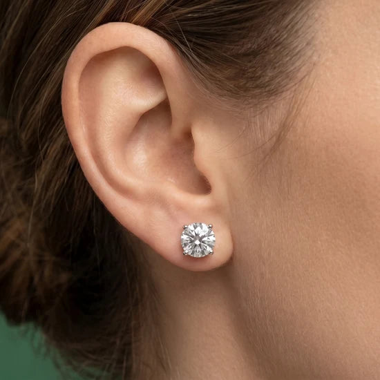 Solitaire round cut diamond stud earrings