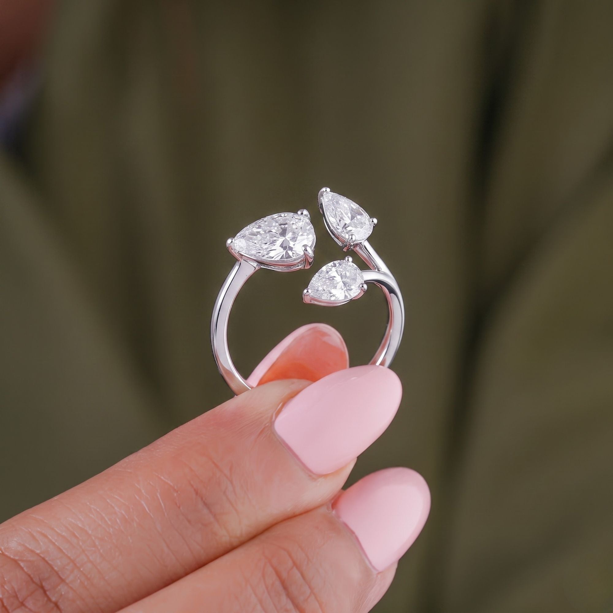 nature inspired engagement ring with leaves diamond ring.
