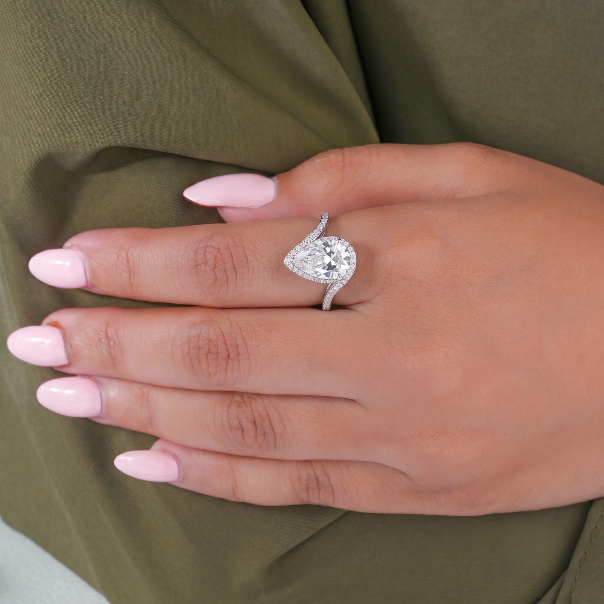 halo engagement ring with cathedral setting ring.
