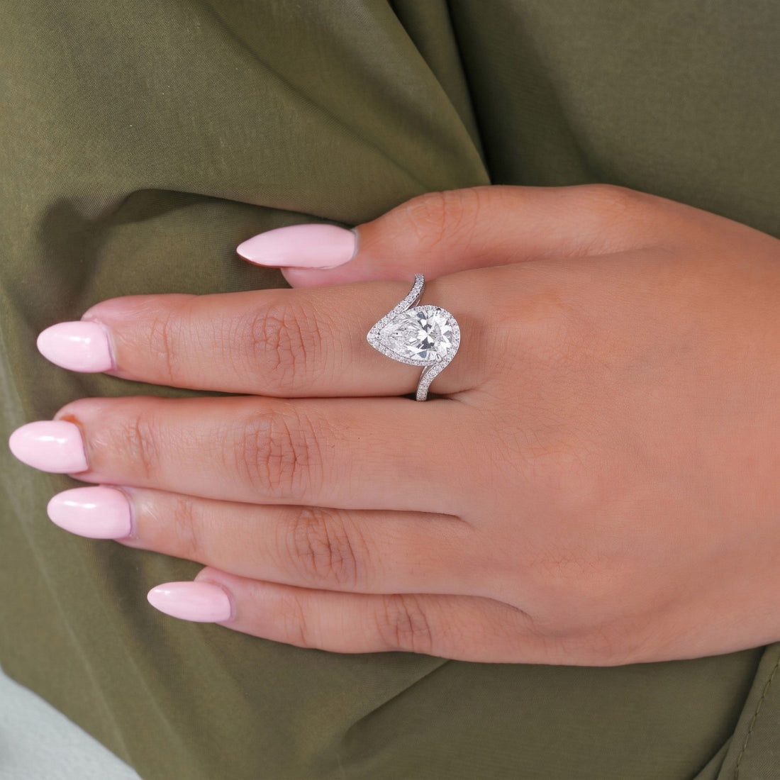 halo engagement ring with cathedral setting ring.
