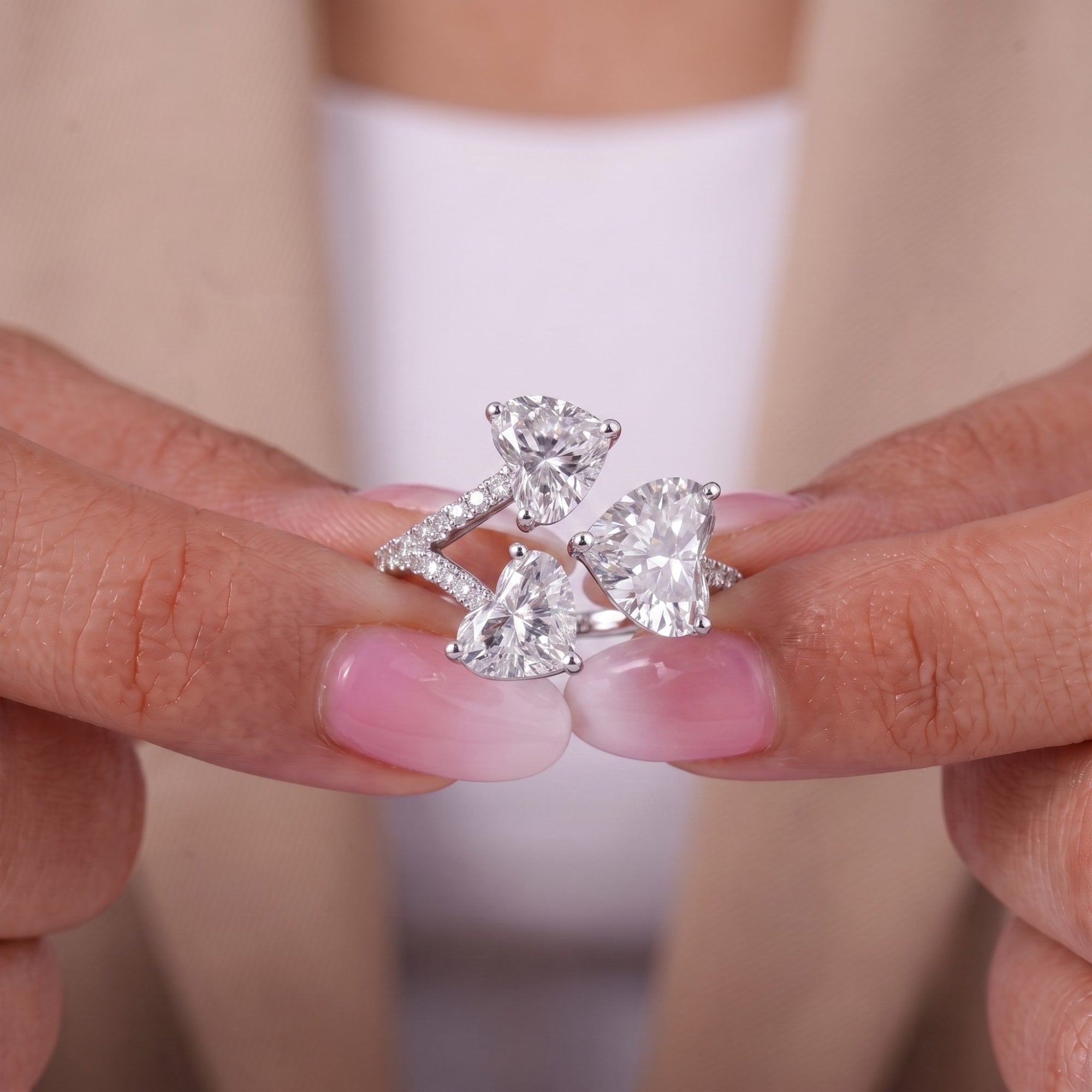 pave engagement ring with round prong setting.

