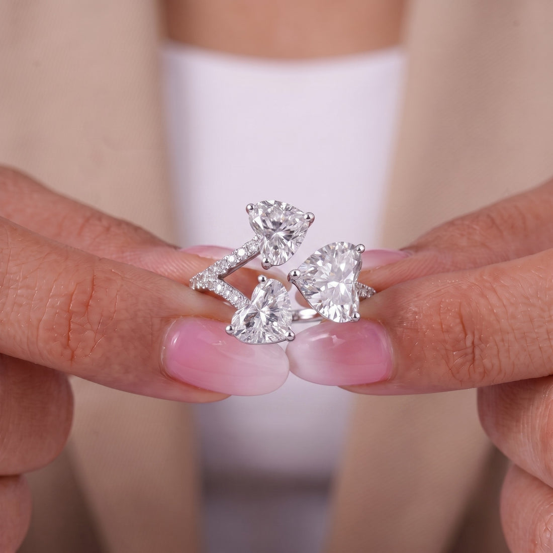 pave engagement ring with round prong setting.
