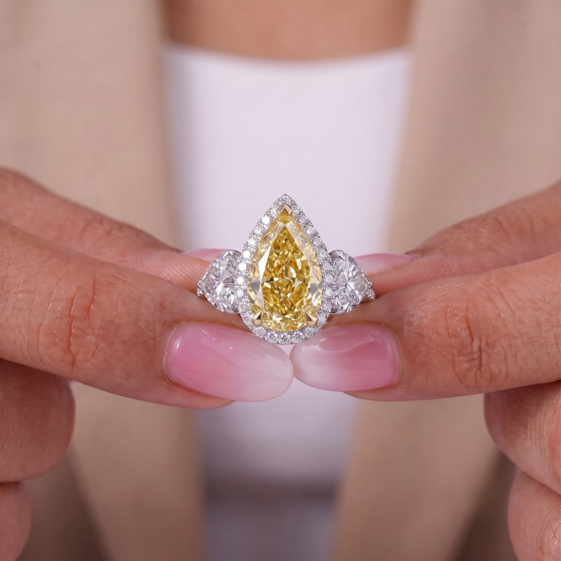 yellow diamond ring with three stone diamond ring.
