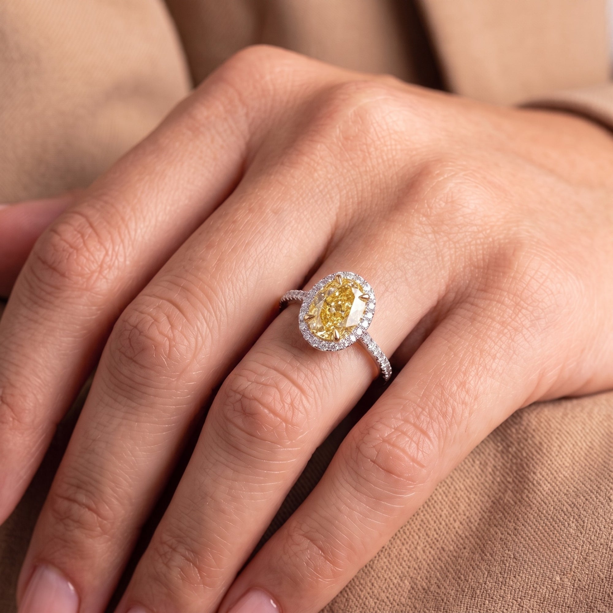 Yellow diamond ring with Claw prong setting.