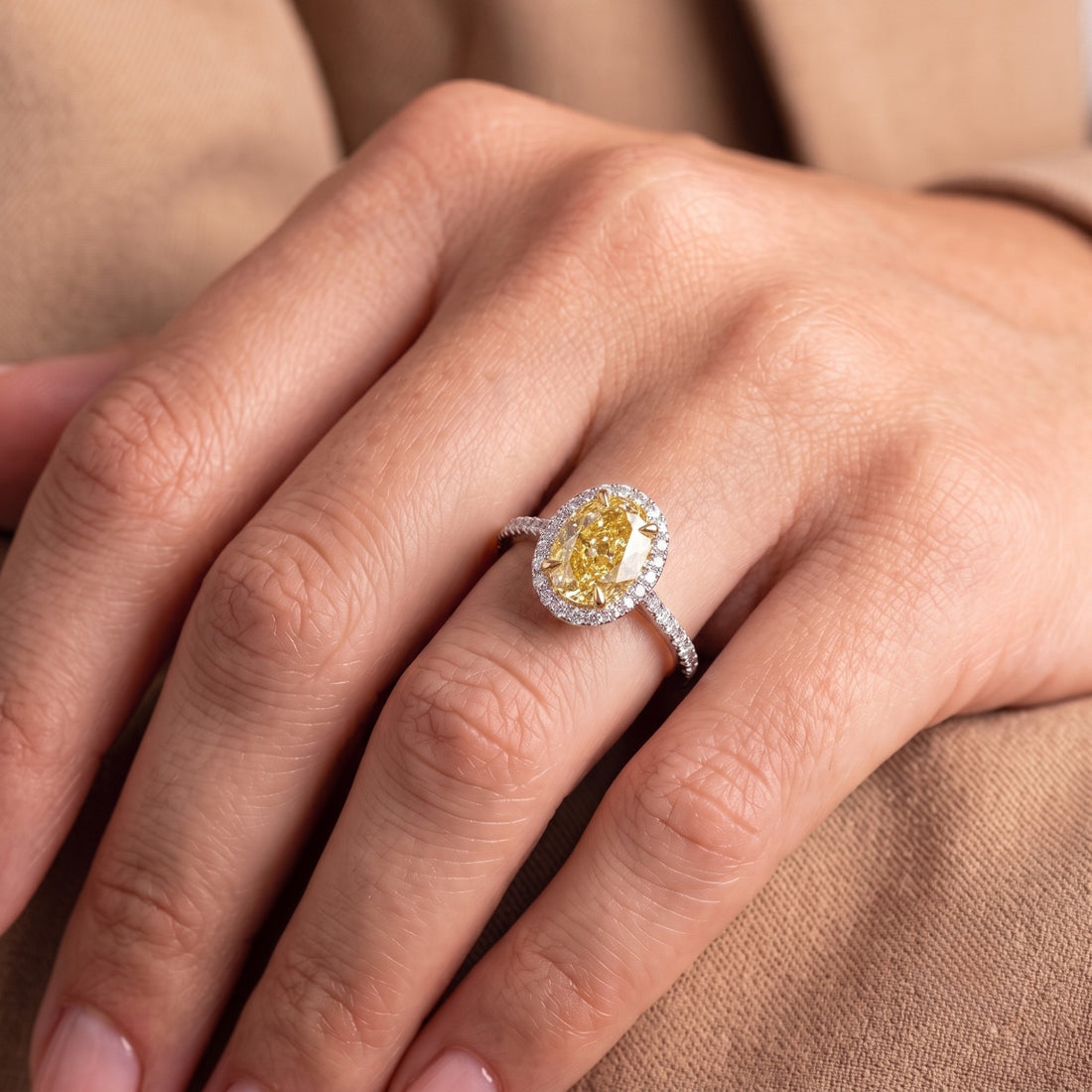 Yellow diamond ring with Claw prong setting.