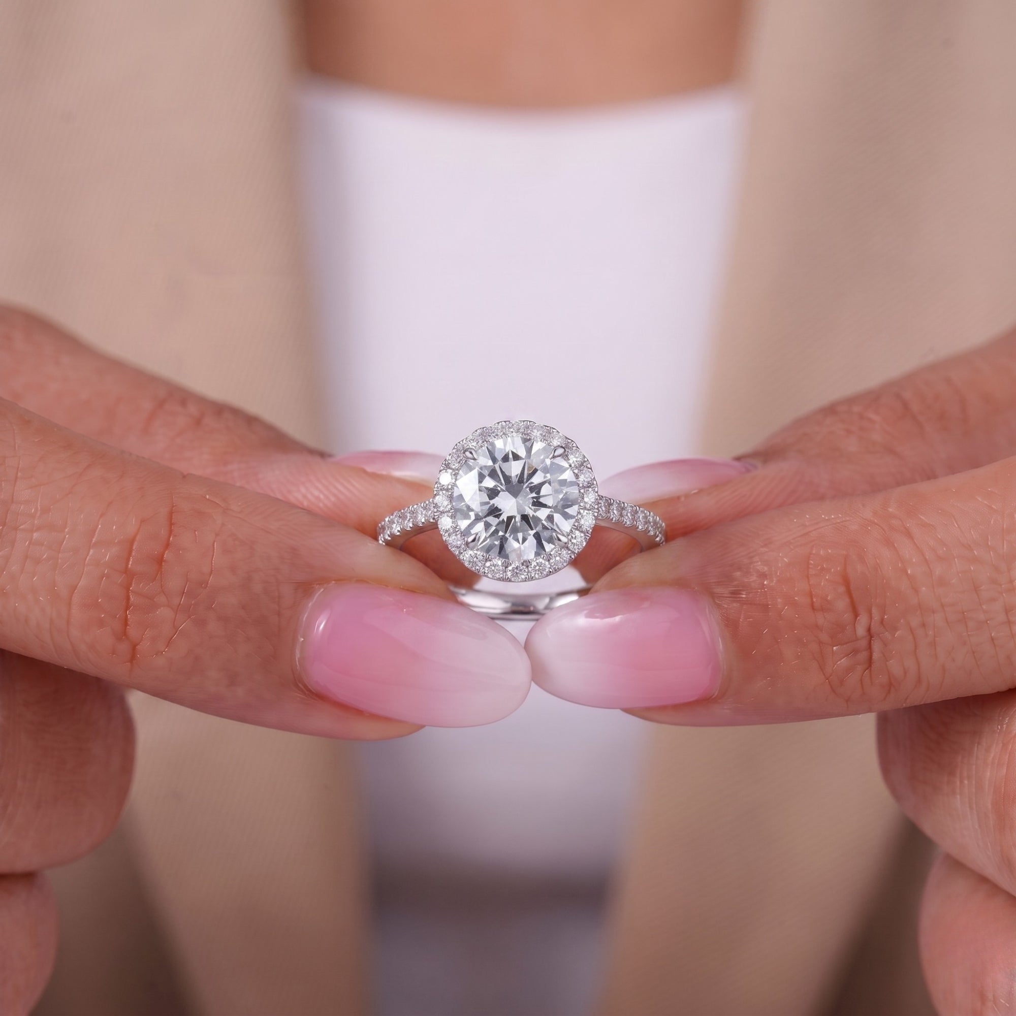 Lumera diamond ring with round cut engagement ring.
