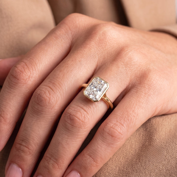 Radiant solitaire ring with Split shank setting.

