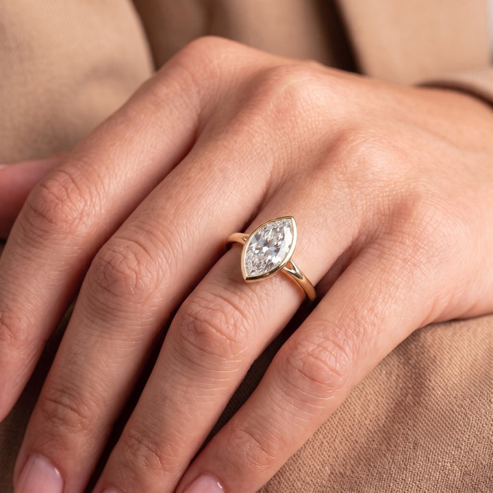 Open Bezel Solitaire Marquise Engagement Ring