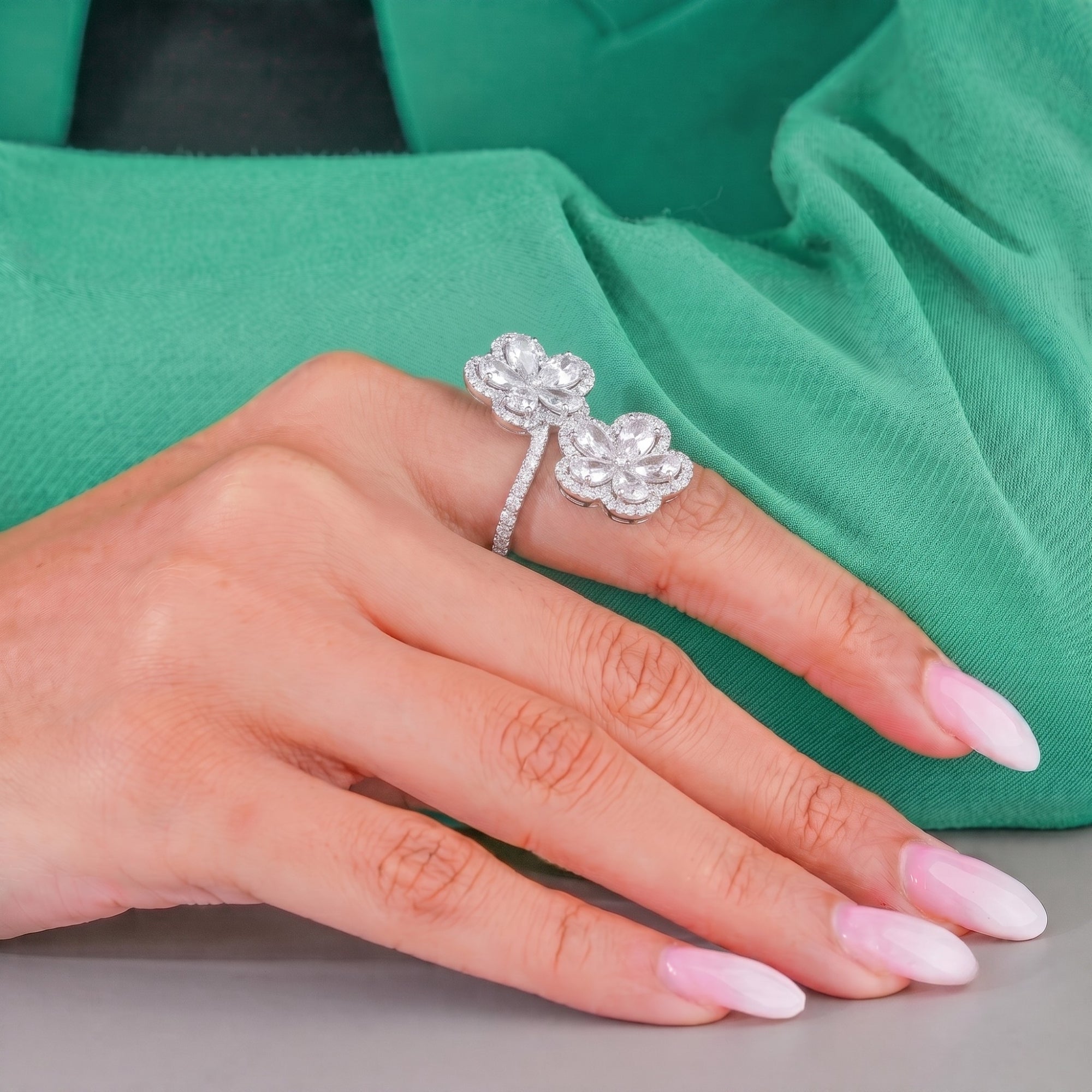 nature inspired engagement ring with flower shaped engagement ring.
