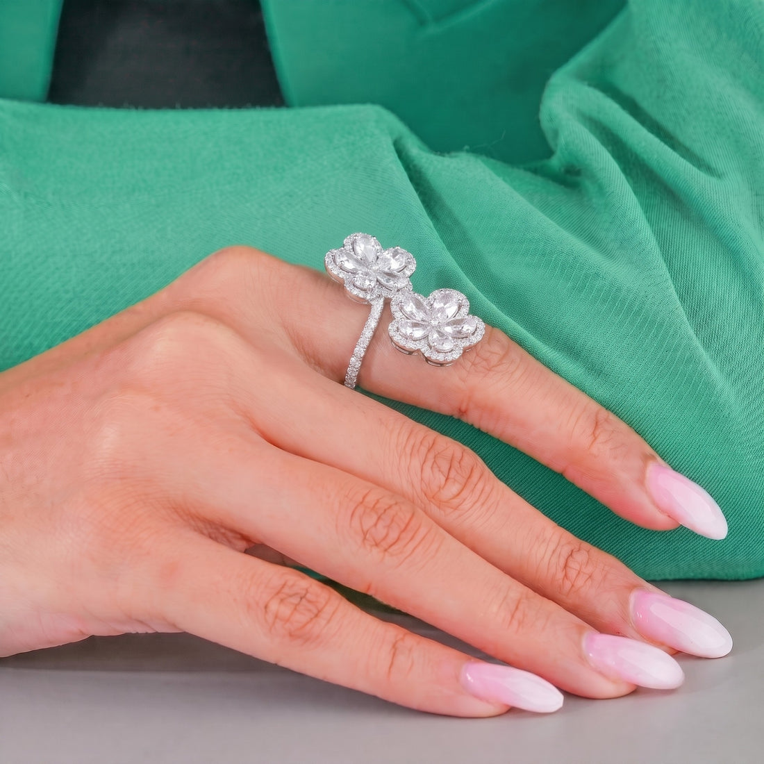 nature inspired engagement ring with flower shaped engagement ring.
