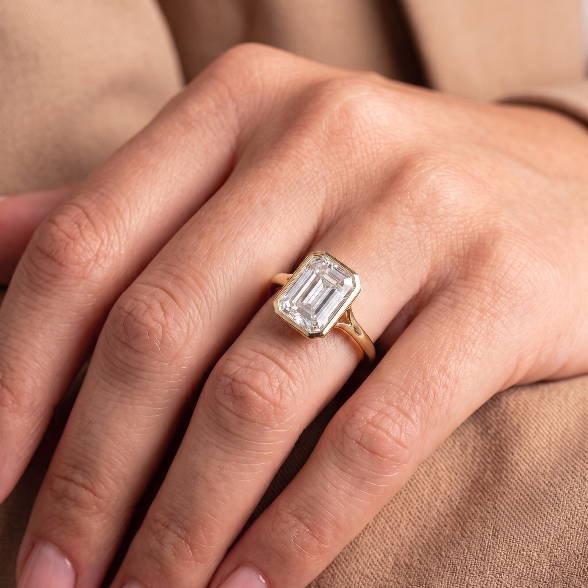 Emerald cut diamond ring with solitaire engagement ring.
