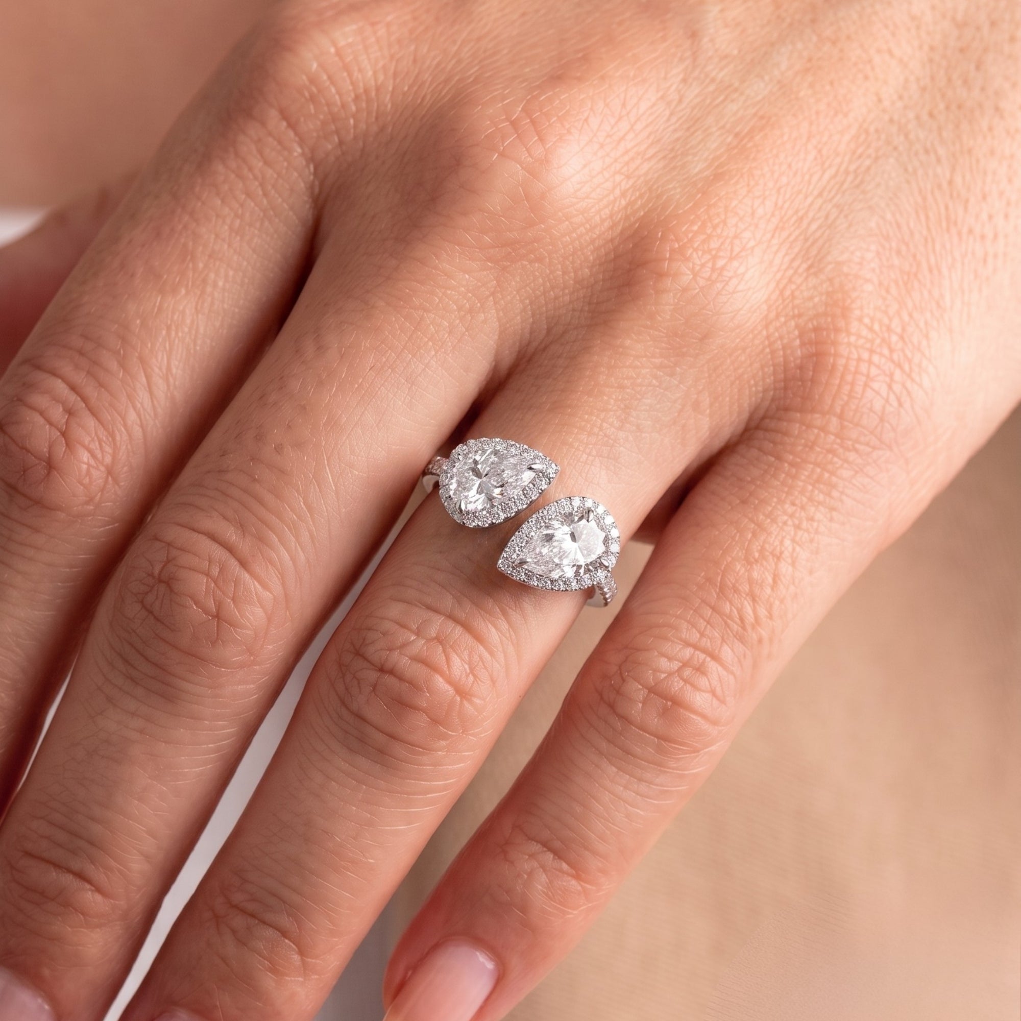 pave engagement ring with bypass setting ring.

