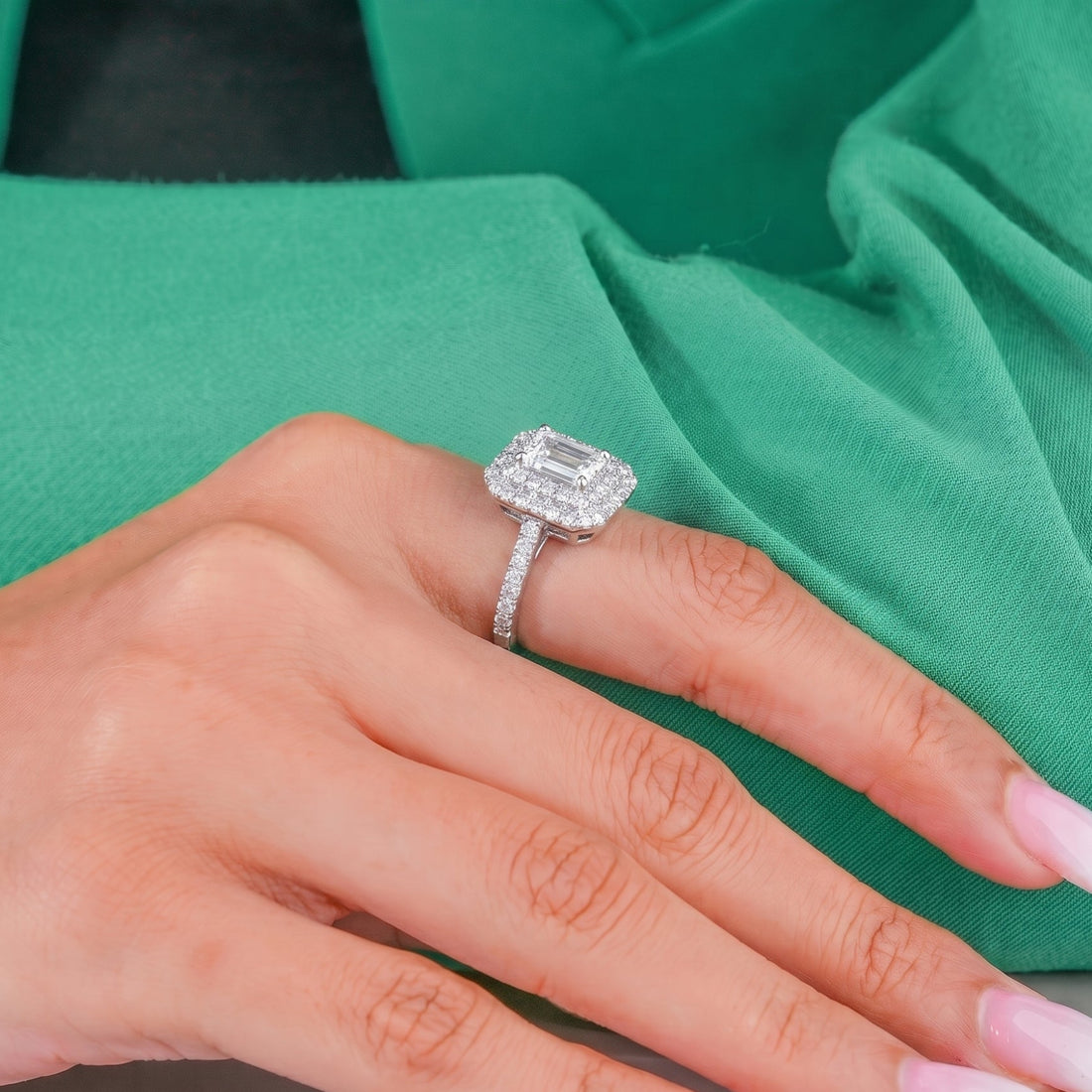 Emerald cut diamond engagement ring with customized ring.
