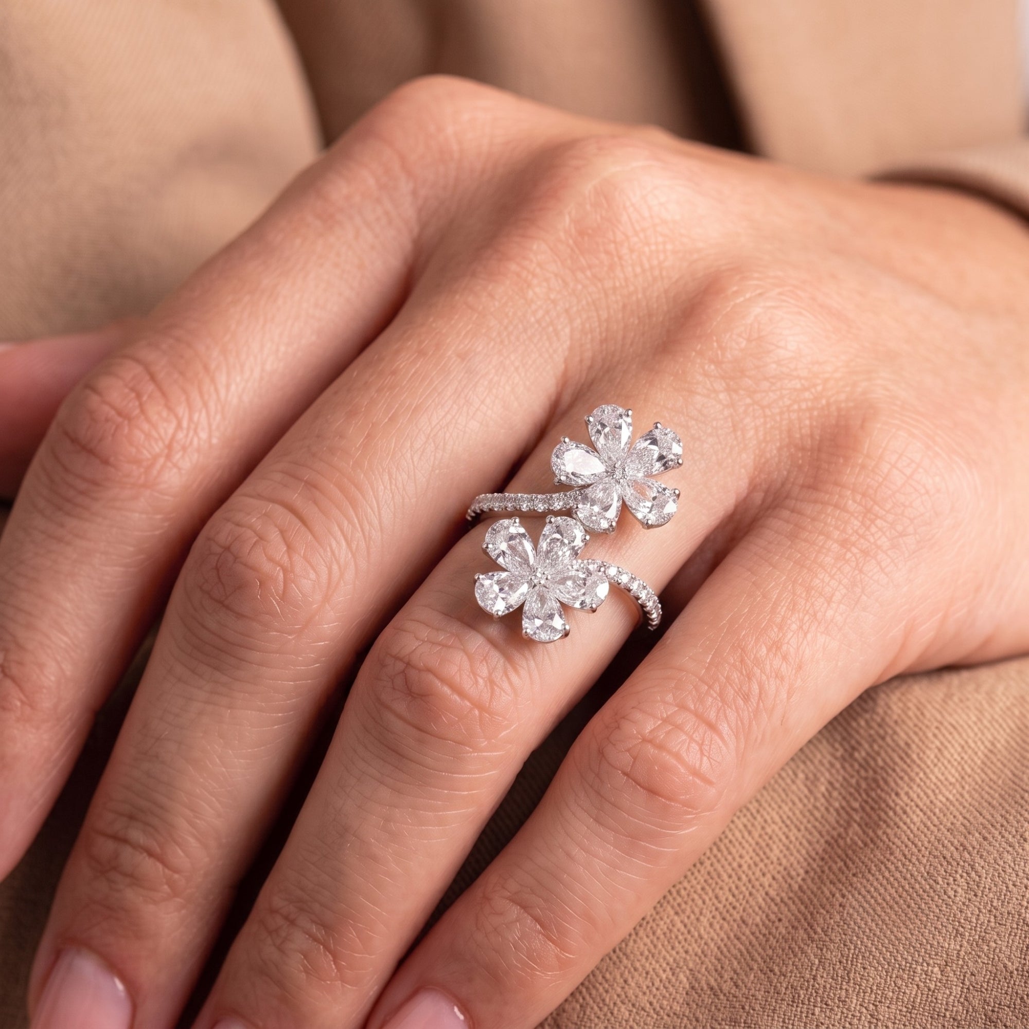 pear diamond ring with round prong setting.
