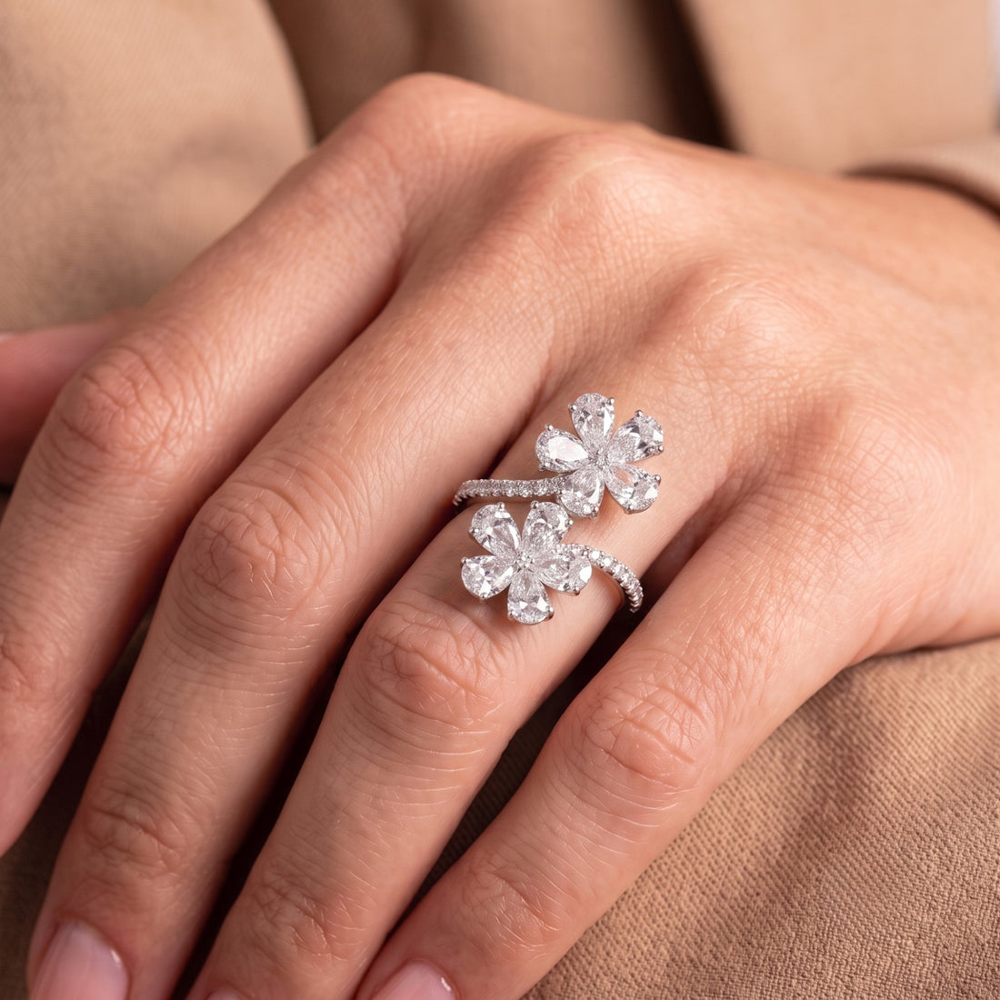 pear diamond ring with round prong setting.
