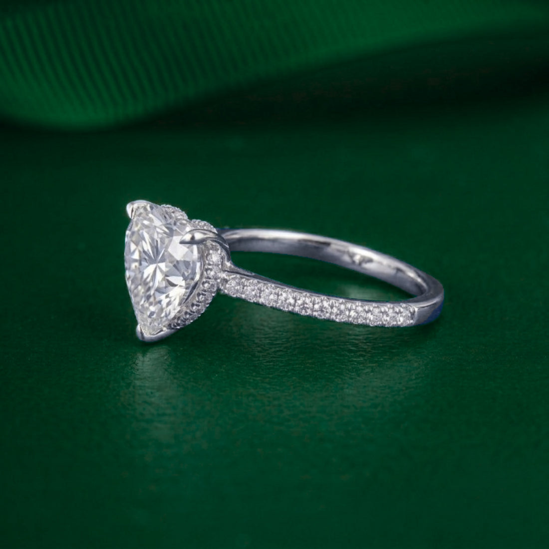 heart diamond ring with claw prong setting.

