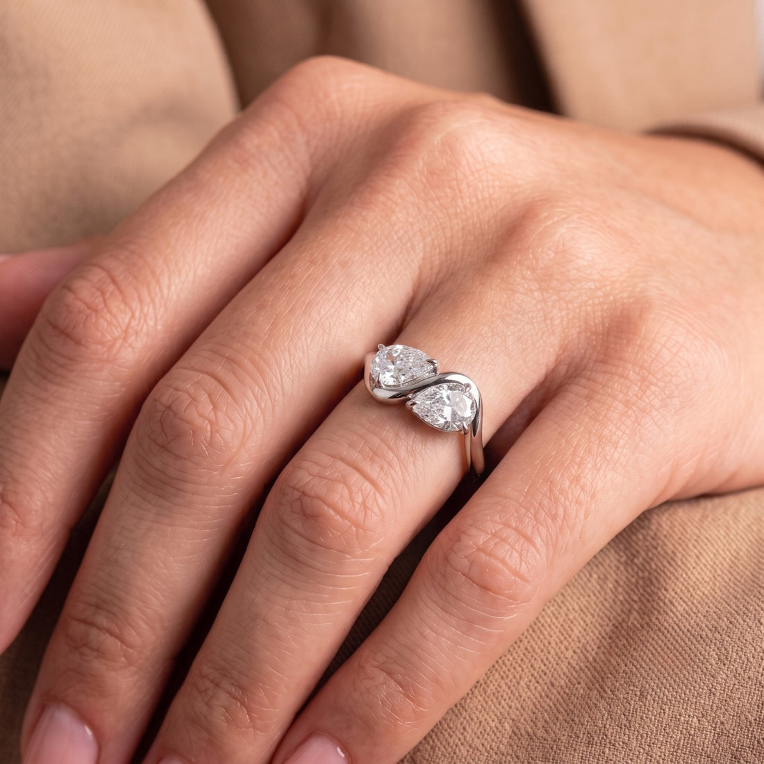 Claw prong setting with solid gold ring.
