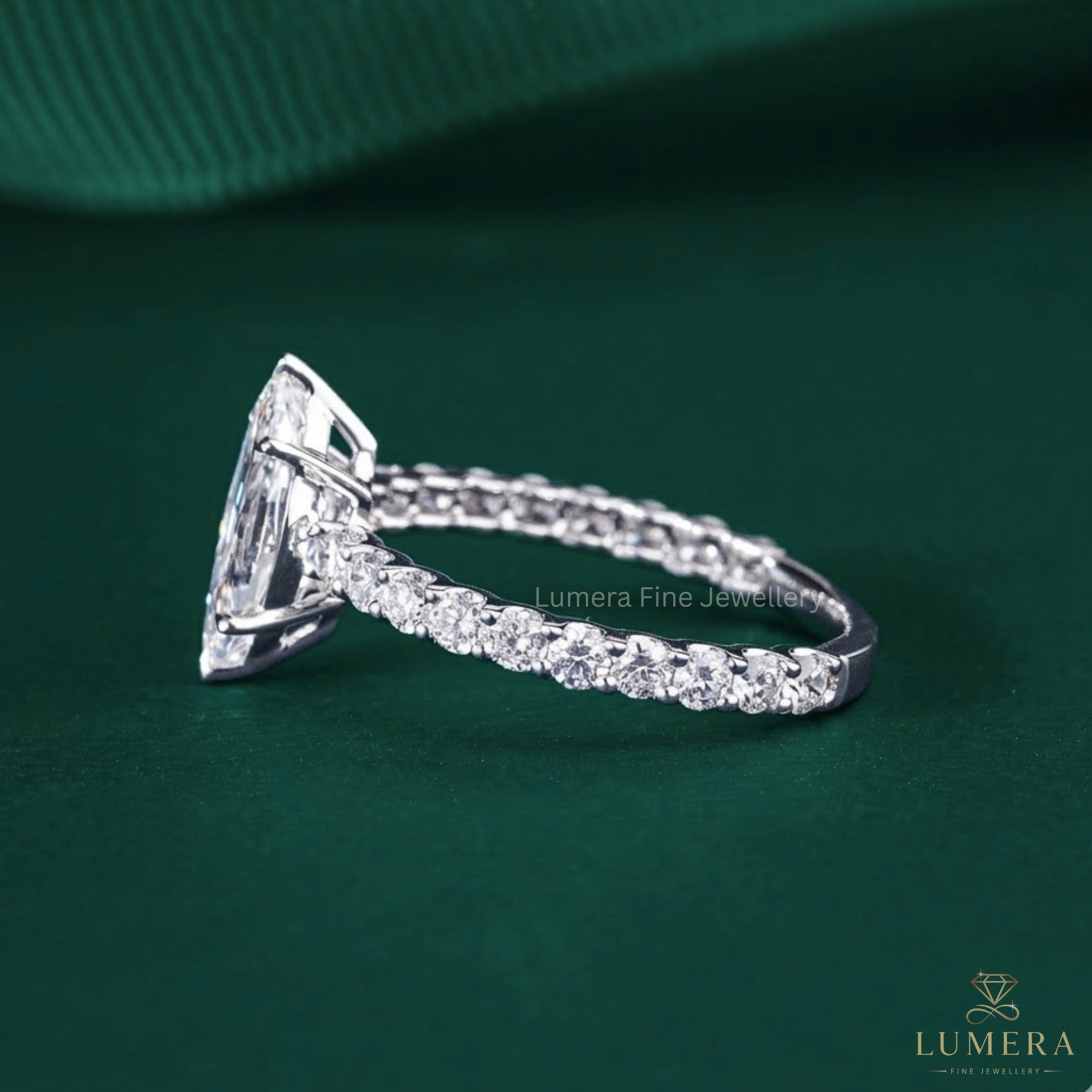 Marquise diamond ring with basket setting ring.