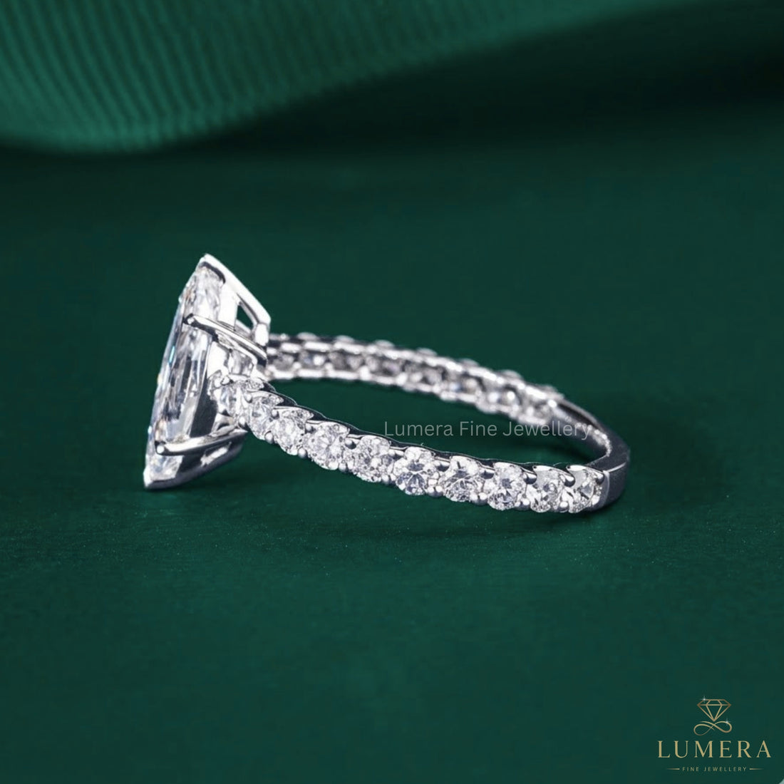 Marquise diamond ring with basket setting ring.