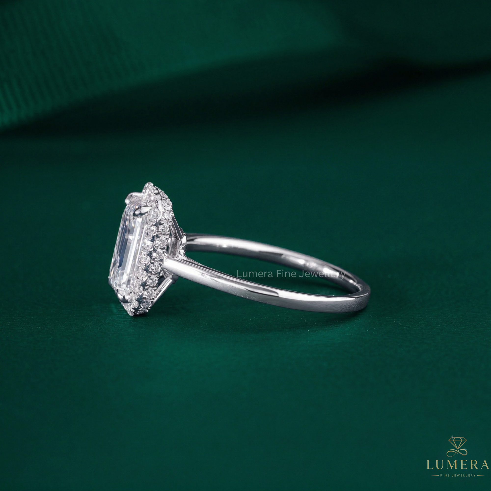 emerald halo engagement ring with emerald cut halo ring.
