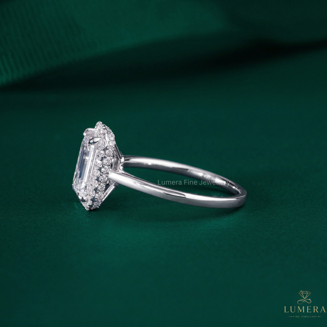 emerald halo engagement ring with emerald cut halo ring.