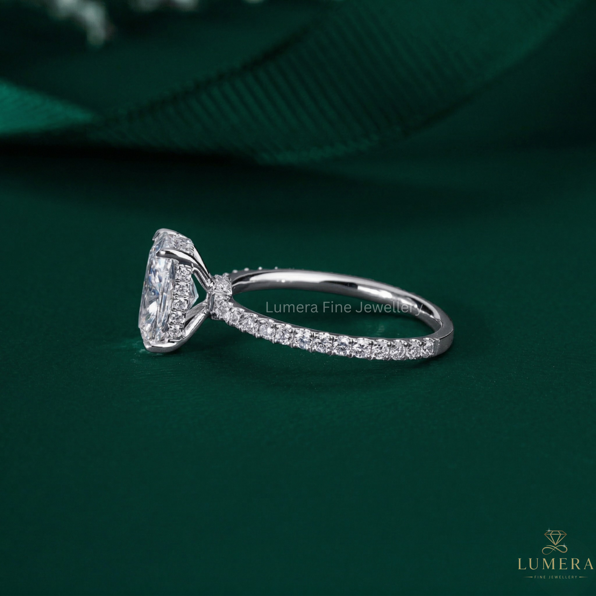 pave set engagement ring with 4 claw prong set.
