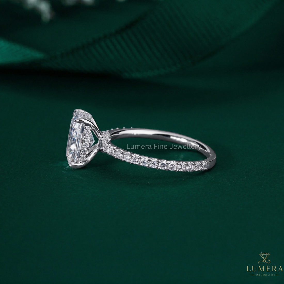 pave set engagement ring with 4 claw prong set.
