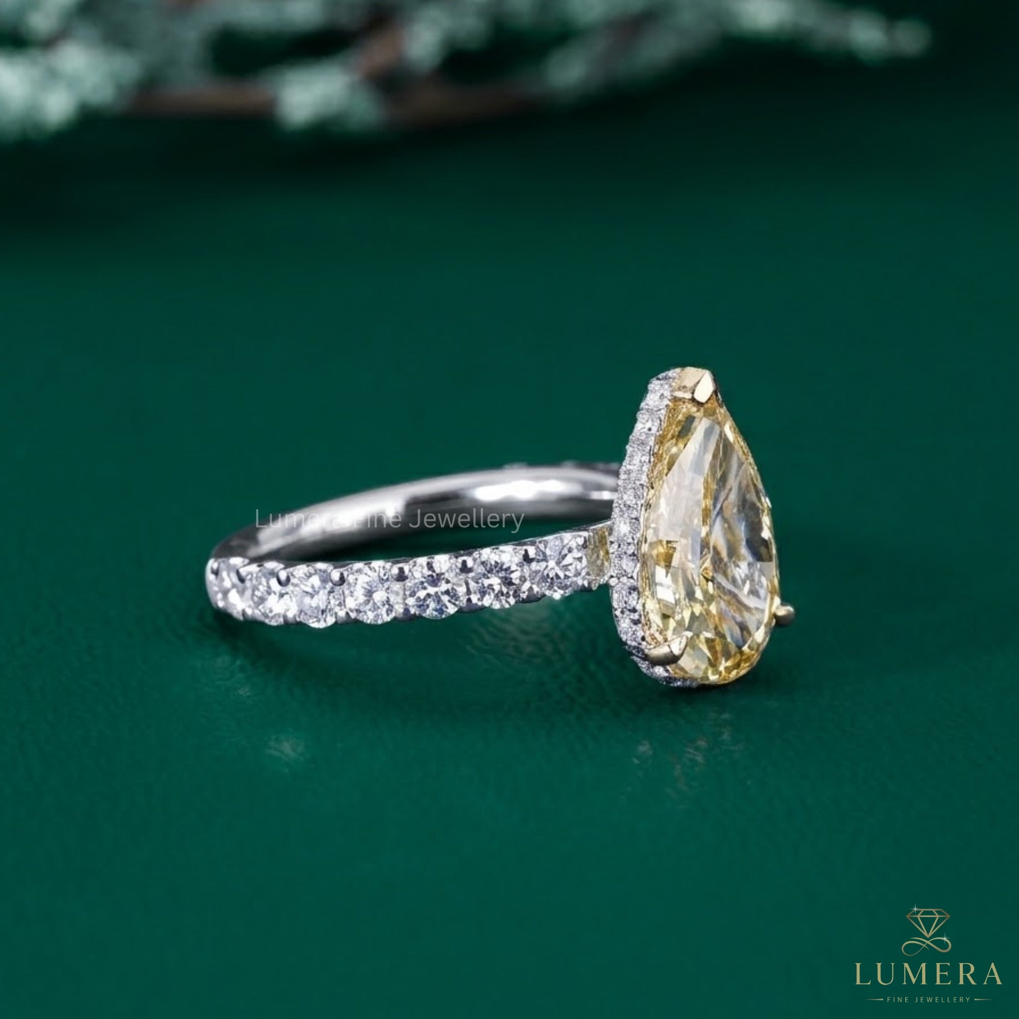 pear engagement ring with hidden halo engagement ring.