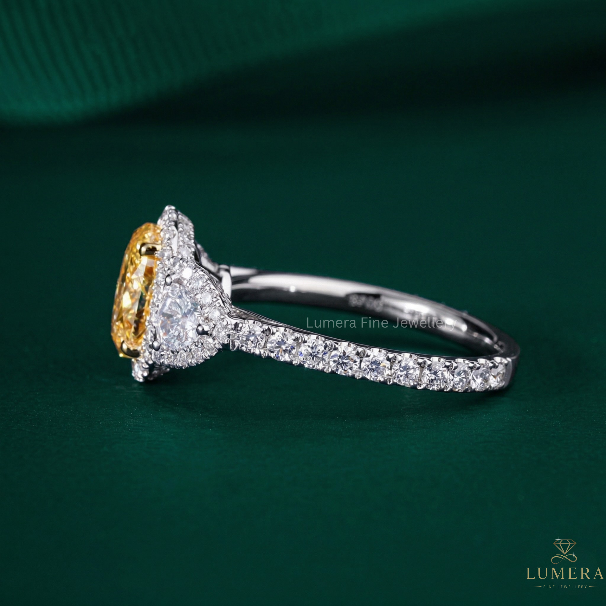 Halo setting ring in unique engagement ring style.
