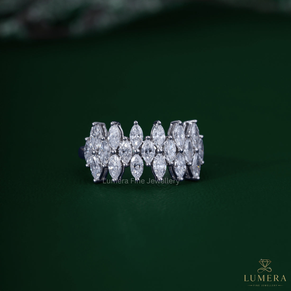 multi row marquise diamond band with round prong setting.
