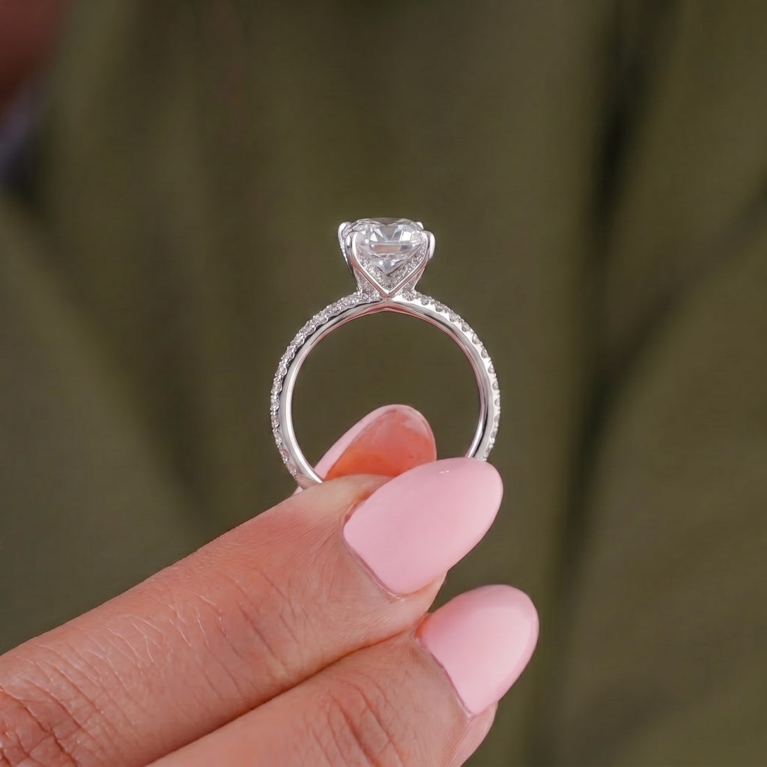 claw prong setting with solid gold ring.
