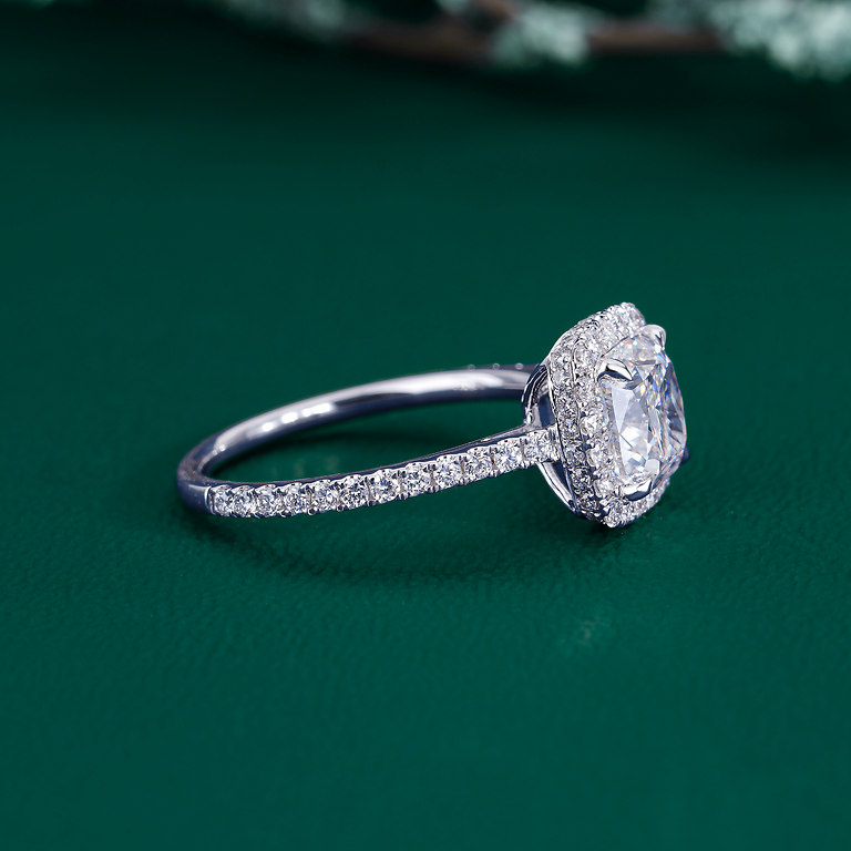 cushion cut engagement ring with cathedral setting ring.
