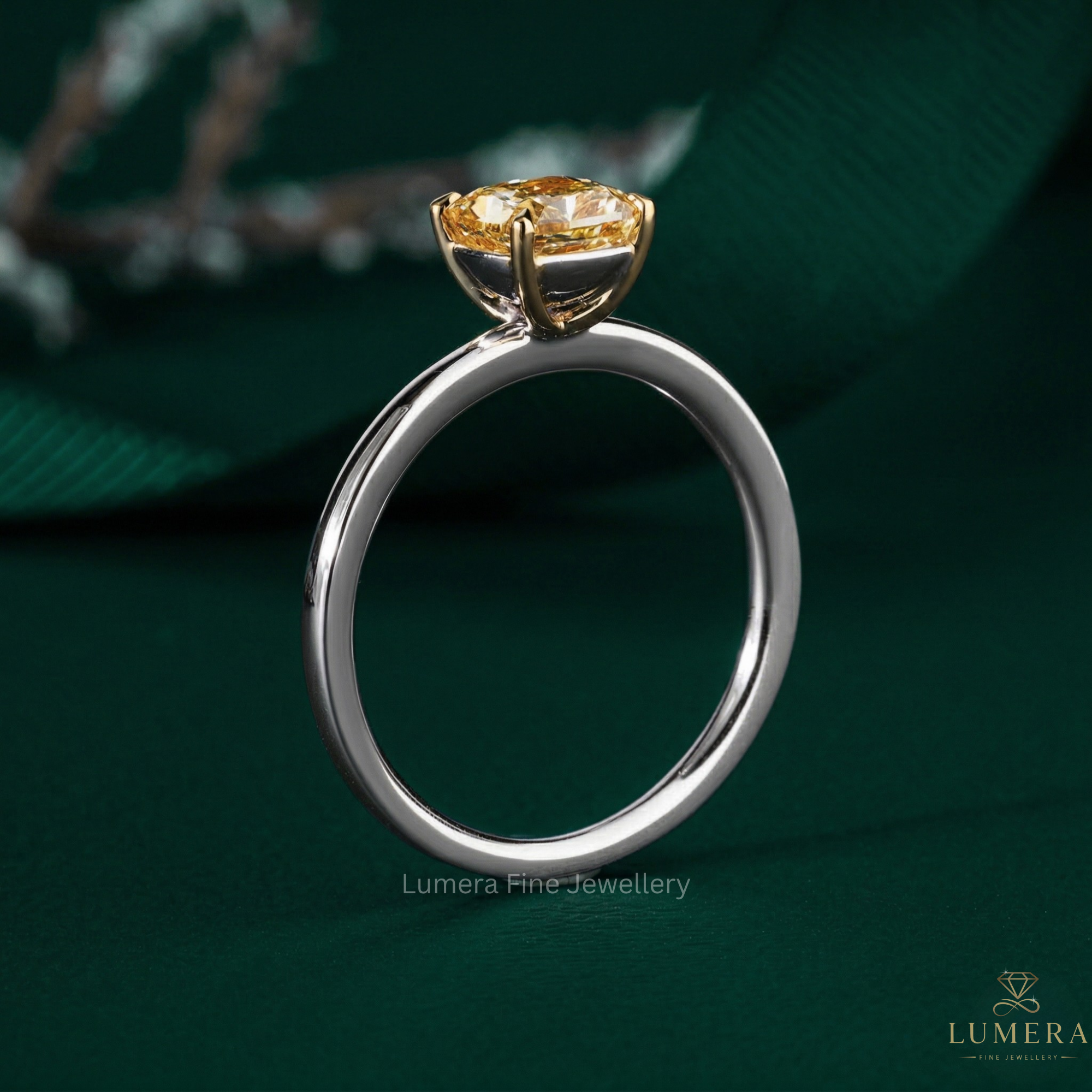 cushion cut engagement ring with claw prong setting.